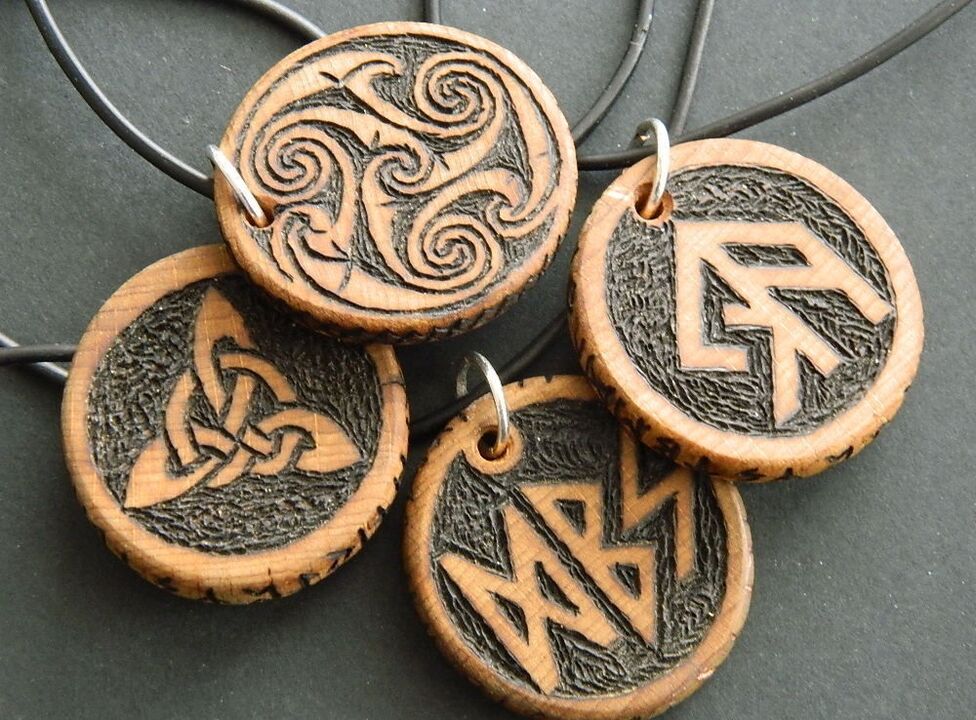 Pendant with runes as a good luck charm
