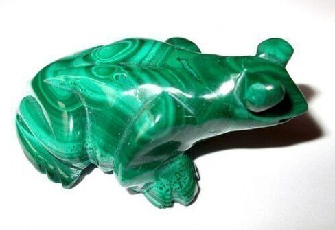 green malachite frog in the shape of an amulet of luck